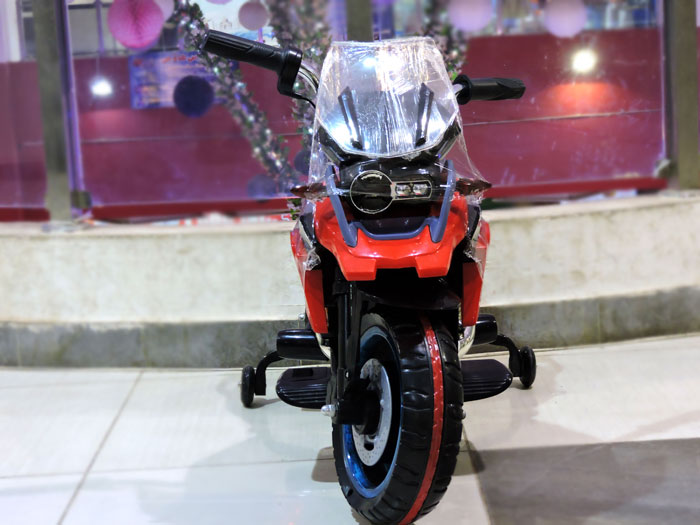 Kids Ride on Motocycle 12V Avigo GS1200 Hand Accelerator Function with Lighting Wheels