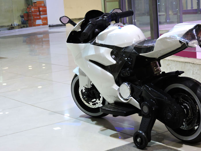 Hollicy Ride On Battery Bike For Kid Foot Race Lighting Wheel