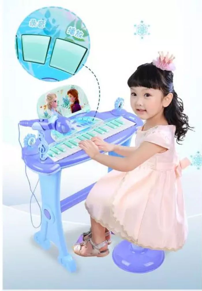 Frozen Electronic Musical Piano With Microphone
