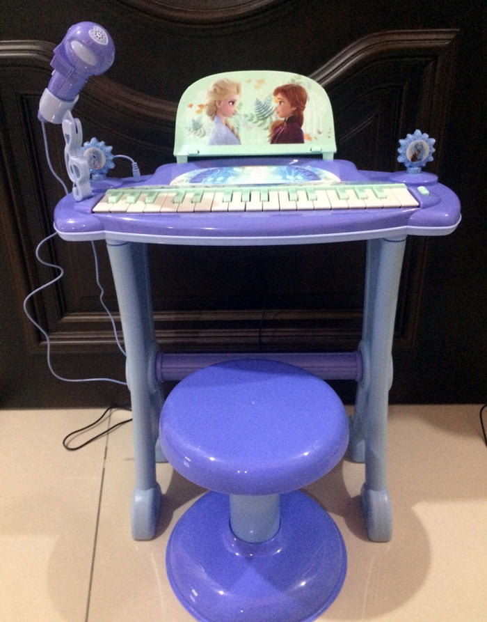 Frozen Electronic Musical Piano With Microphone