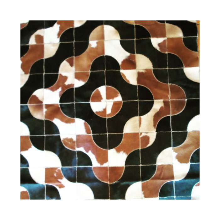 Geometric Base Black And Brown White Cowhide Patchwork Rug
