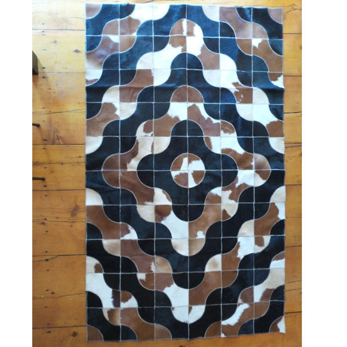 Geometric Base Black And Brown White Cowhide Patchwork Rug