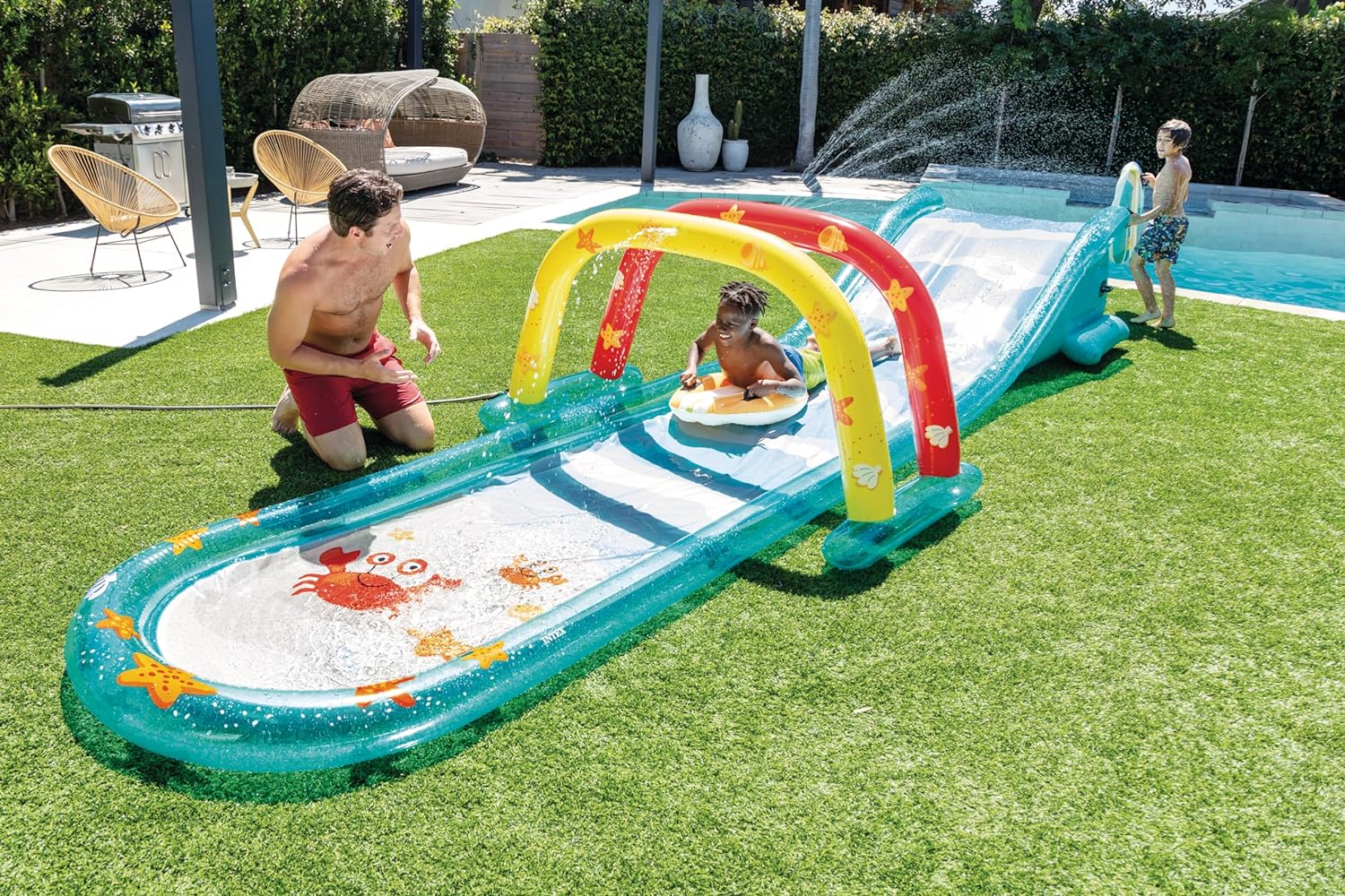 Intex Inflatable Surfing Fun Slide With Two Inflatable Surf Riders – Built-In Water Sprayer – Removable Arch – Carry Handles – 221&Quot; X 54&Quot; X 39&Quot;