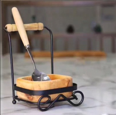 Touch Wood Spoon Holder Next To The Stove
