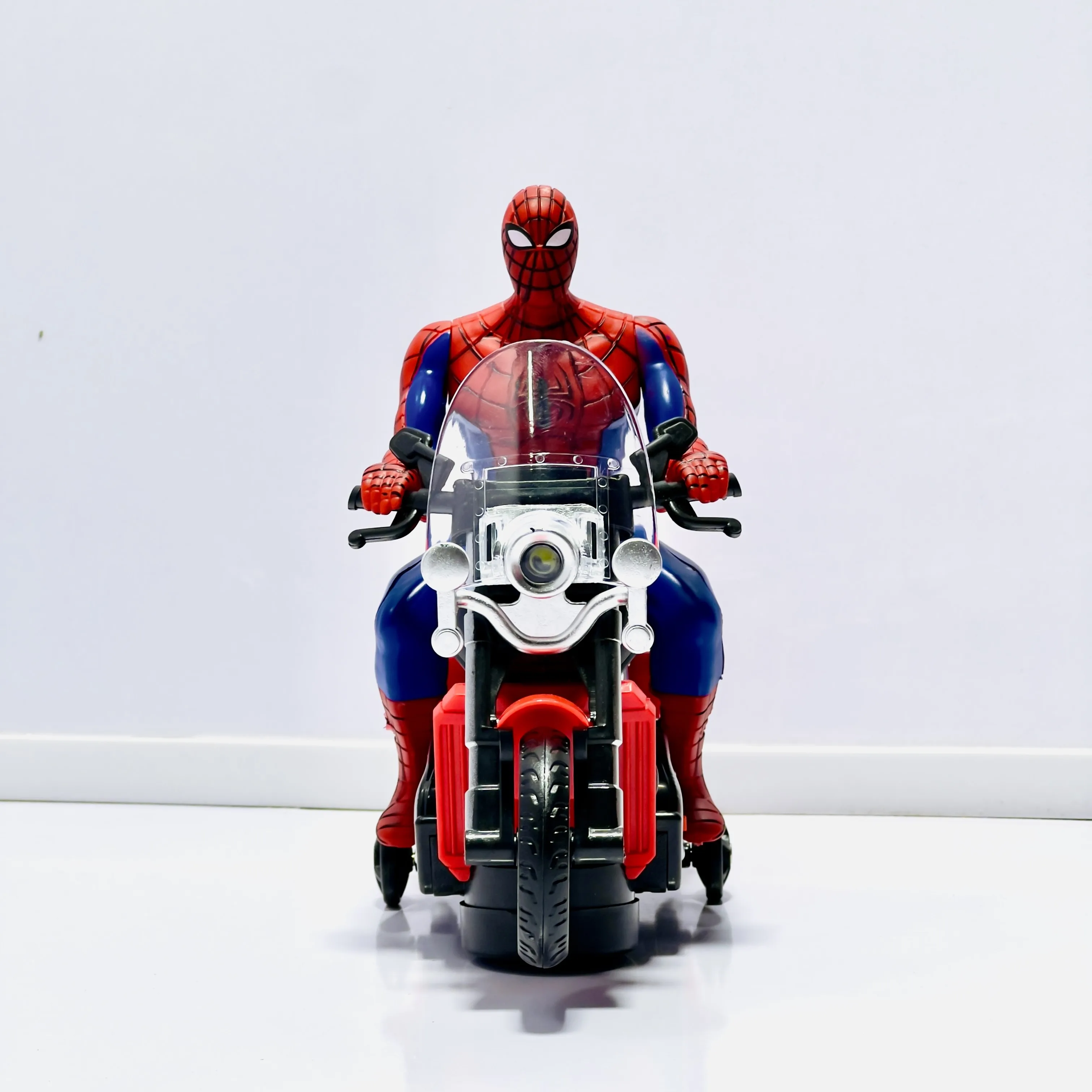 Spider-Man Battery Operated Bike Toy with Flashing Lights & Music – Bump & Go Motorcycle for Kids